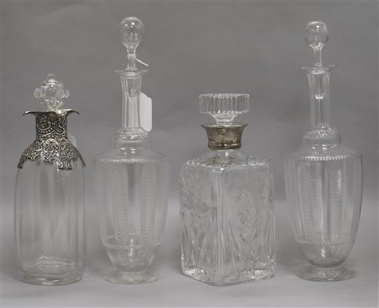 Two silver-mounted decanters and a pair of cut glass decanters silver mounted decanters height 27cm